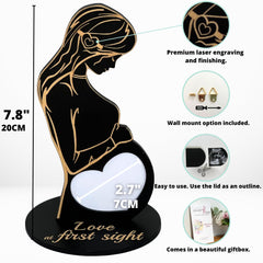 Heart's Sign sonogram frame features black finish and sturdy wooden base for display.