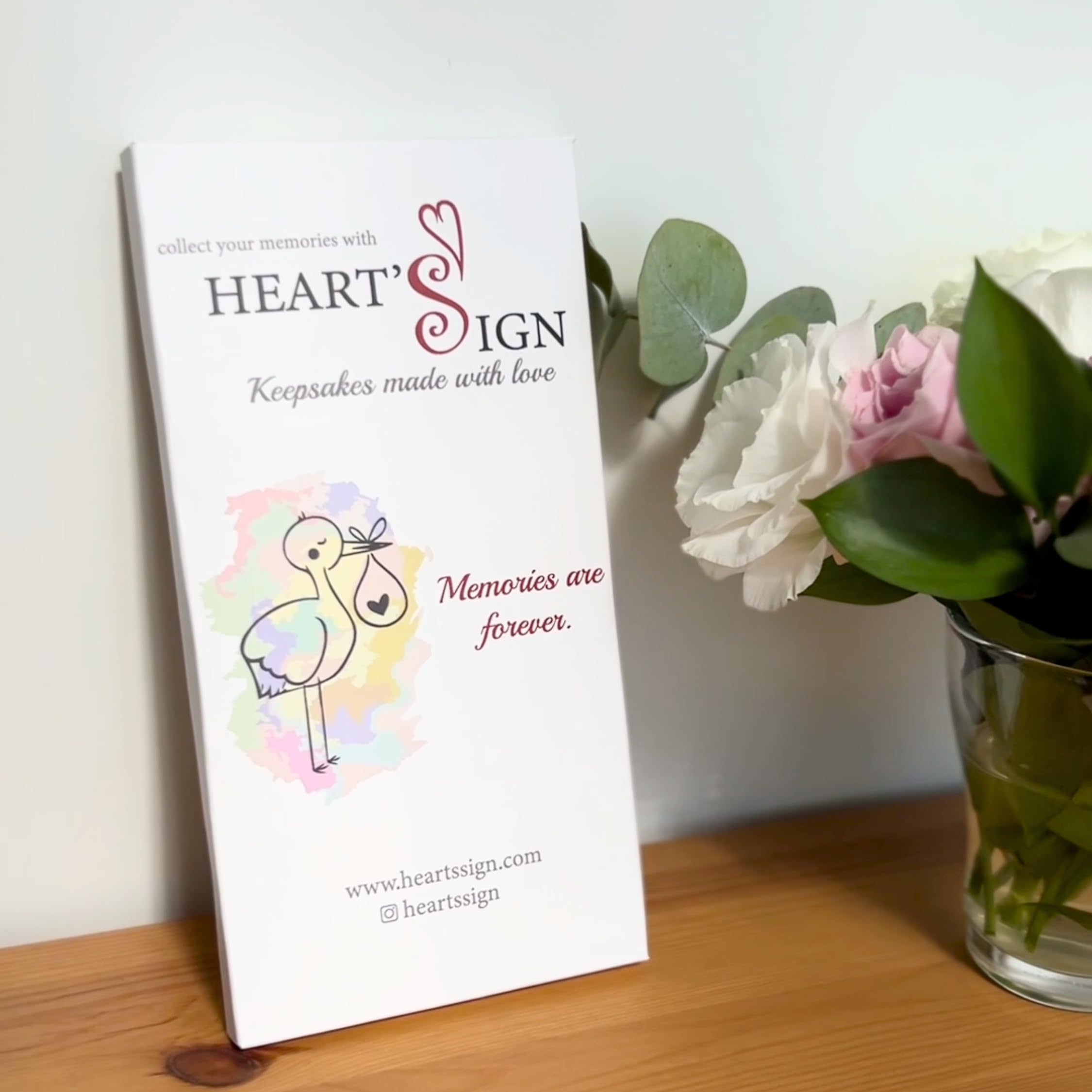 Heart's Sign keepsake frame offers wall or tabletop display options.