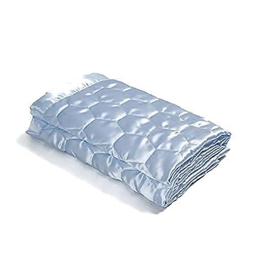 Heavens Cuddles quilted satin baby blanket light blue folded demonstrates compact coziness for travel.