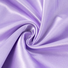 Heavens Cuddles satin blanket in lavender wrapped baby for calming cuddles.