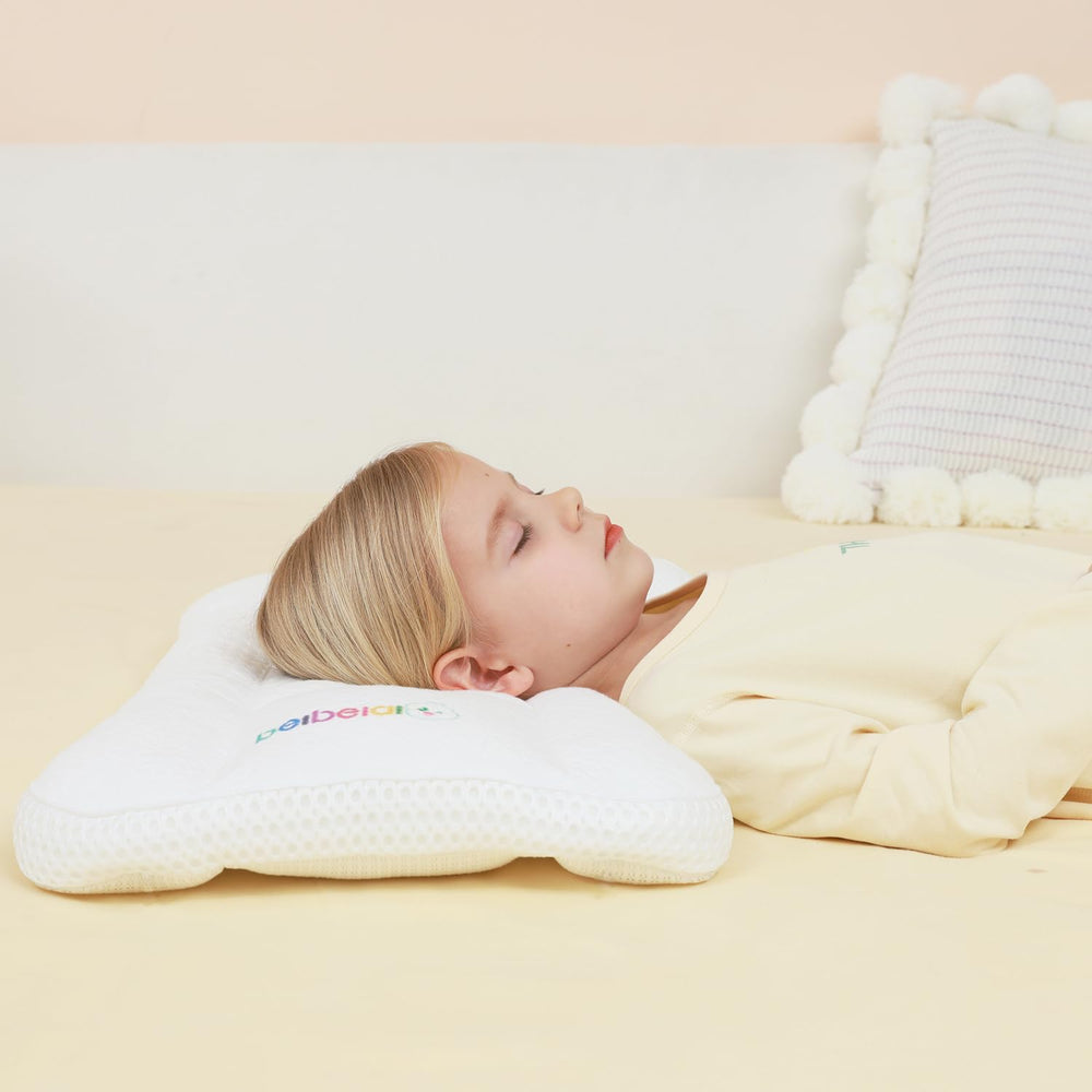 Hebove pillow grows with child providing consistent ergonomic support.