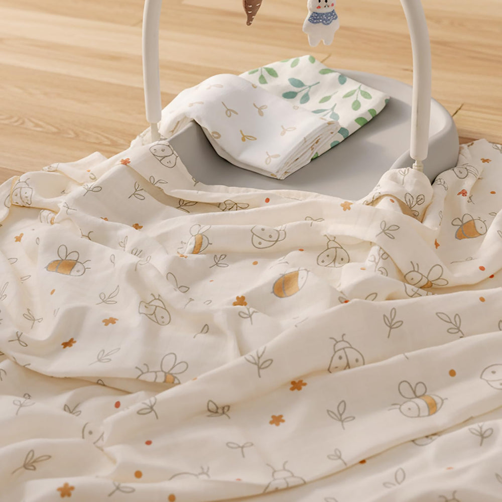 HECCEI garden friend print swaddle shows gender-neutral design for versatile baby comfort.