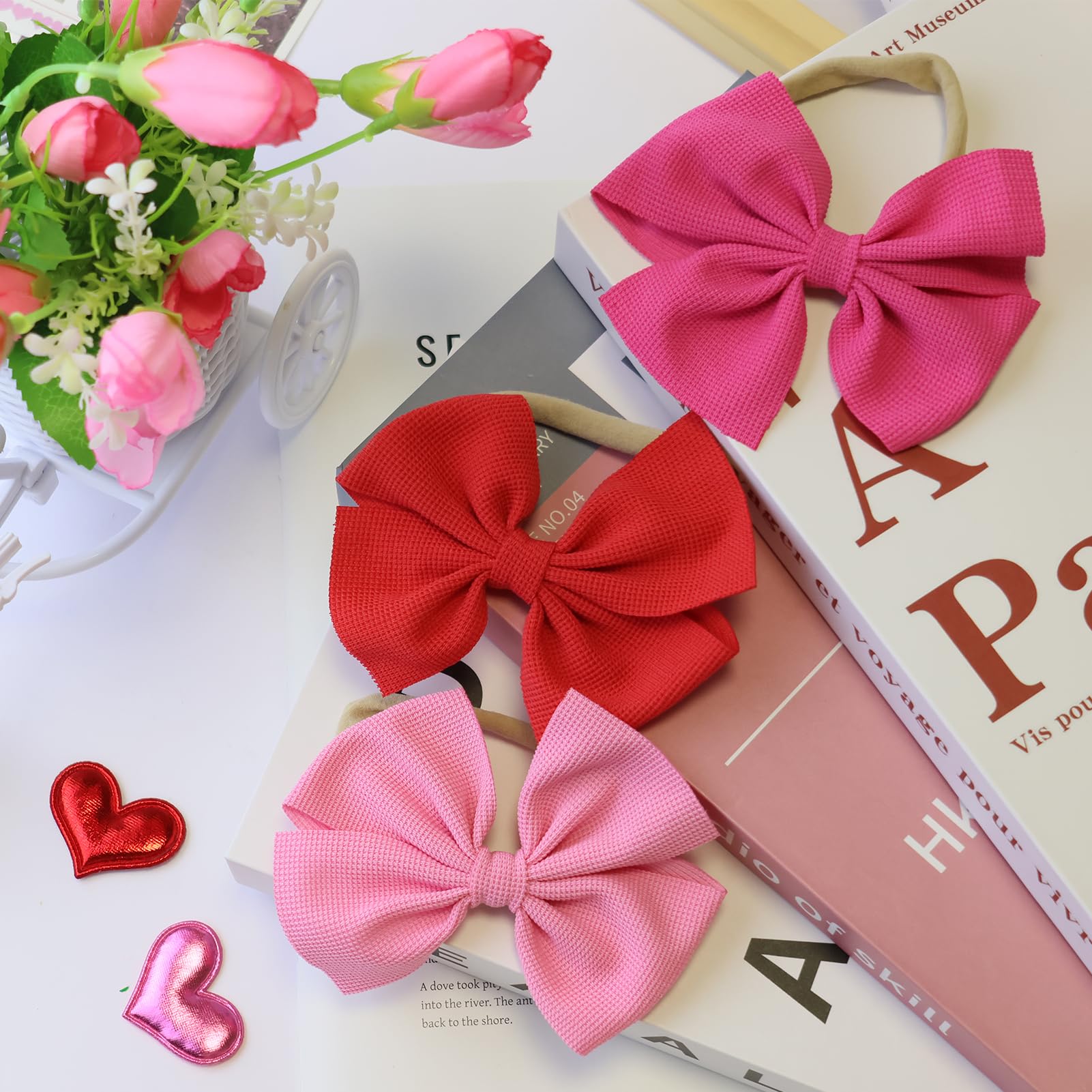 Hellykaka baby headbands worn as timeless newborn photo props.