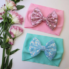 HELYKAKA sequin headbands blue bow on newborn girl, elastic and anti-slip for secure fit.