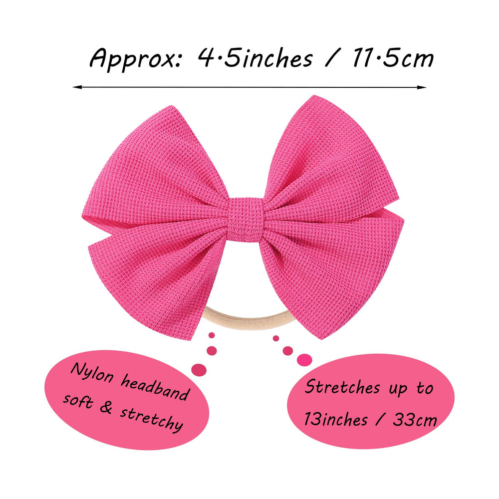 Hellykaka valentines bows on infant and toddler wearers with soft grip.
