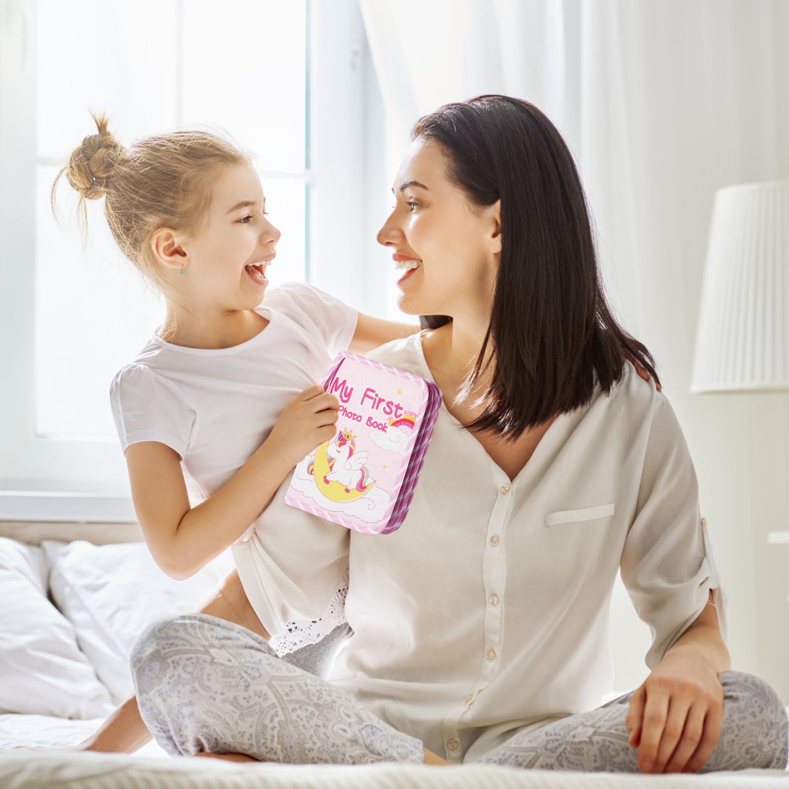 heqxwl family milestones photo book helps preserve memories for future storytelling.
