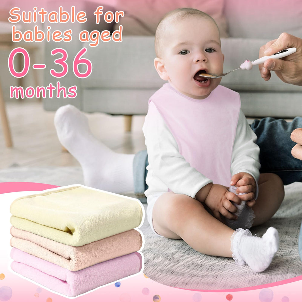 Hercicy trio of colors/bibs neatly stacked demonstrating complete kit for drooling and feeding.