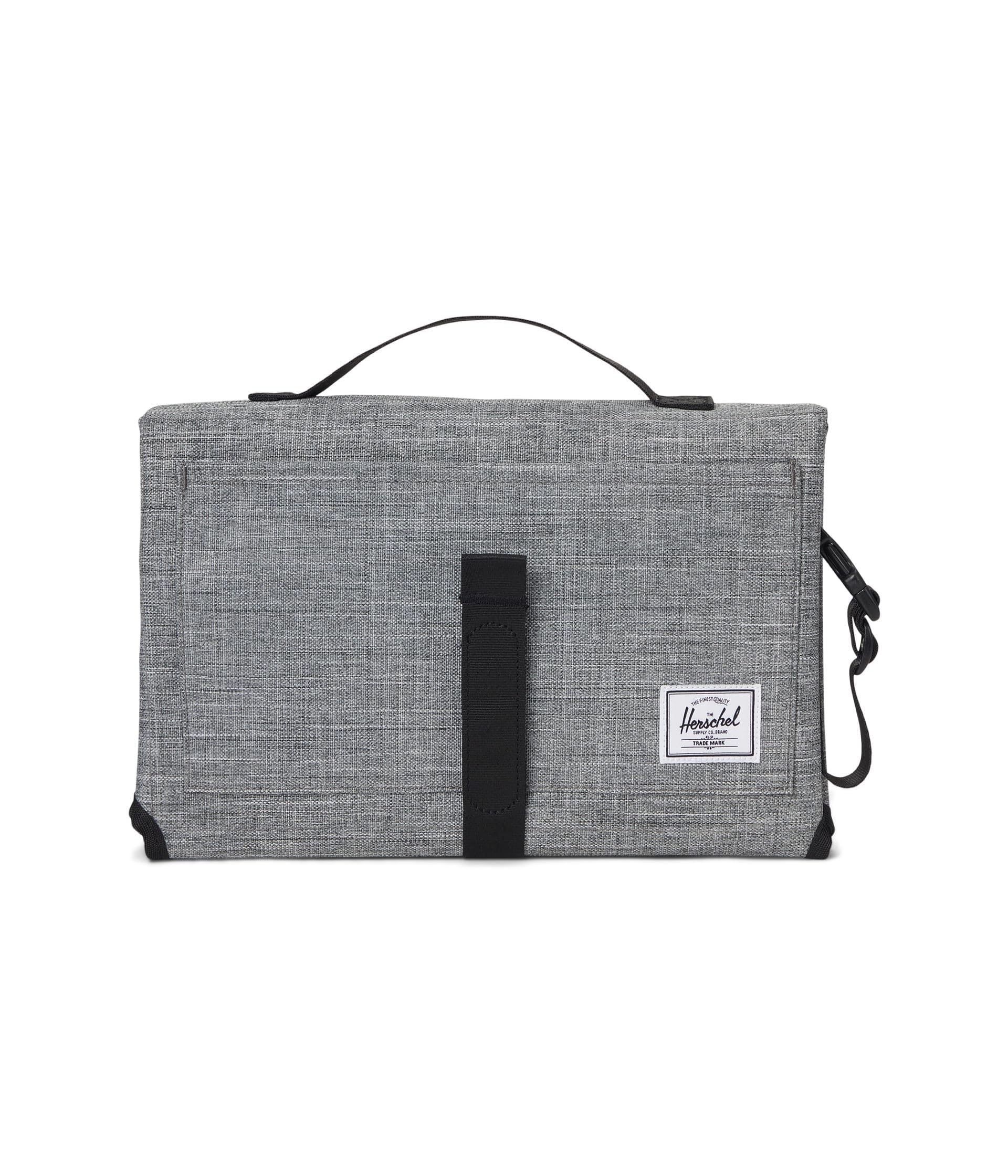 Herschel Sprout Change Mat carry handle enables effortless on-the-go diaper changes.
