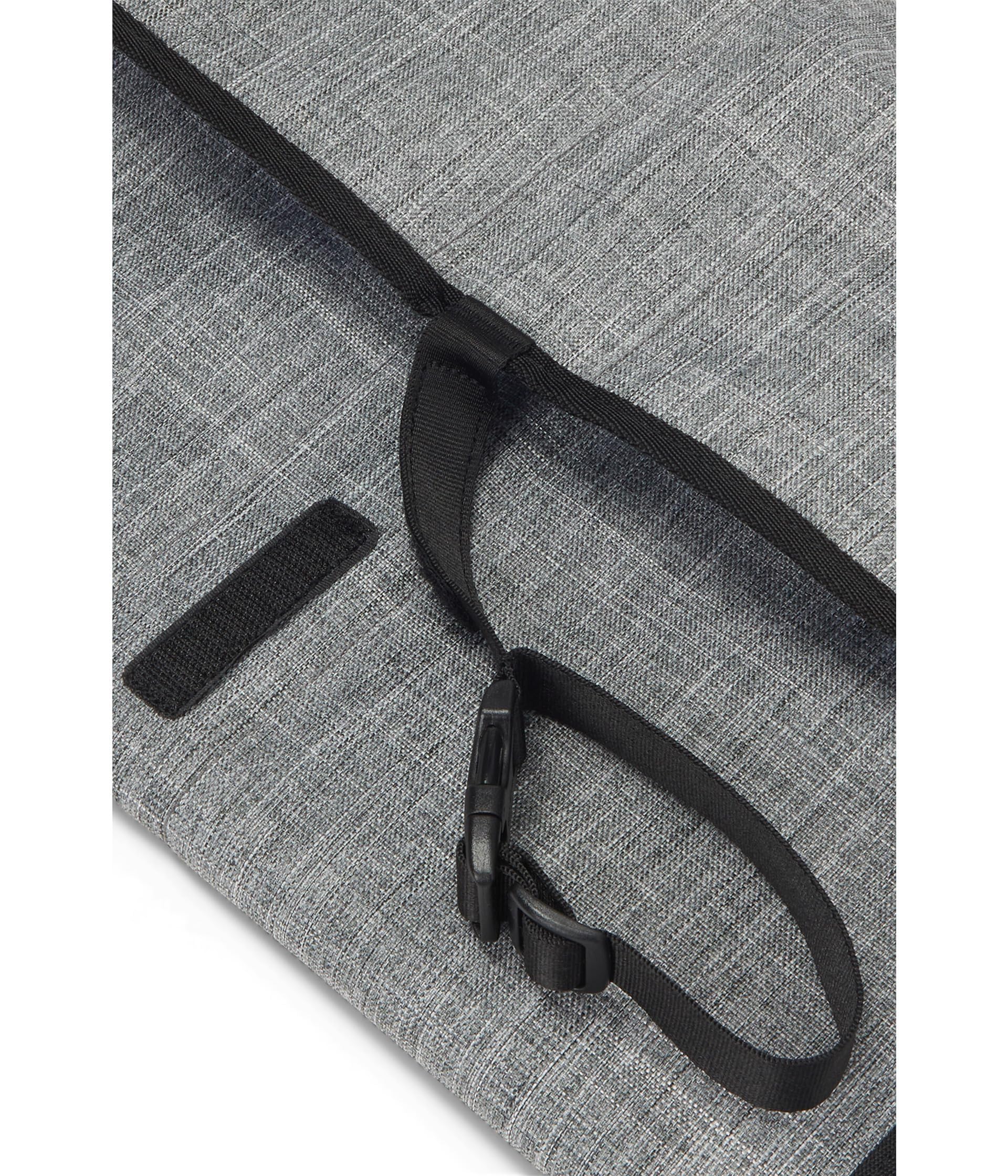 Herschel Sprout Change Mat waterproof surface protects surfaces during changes.