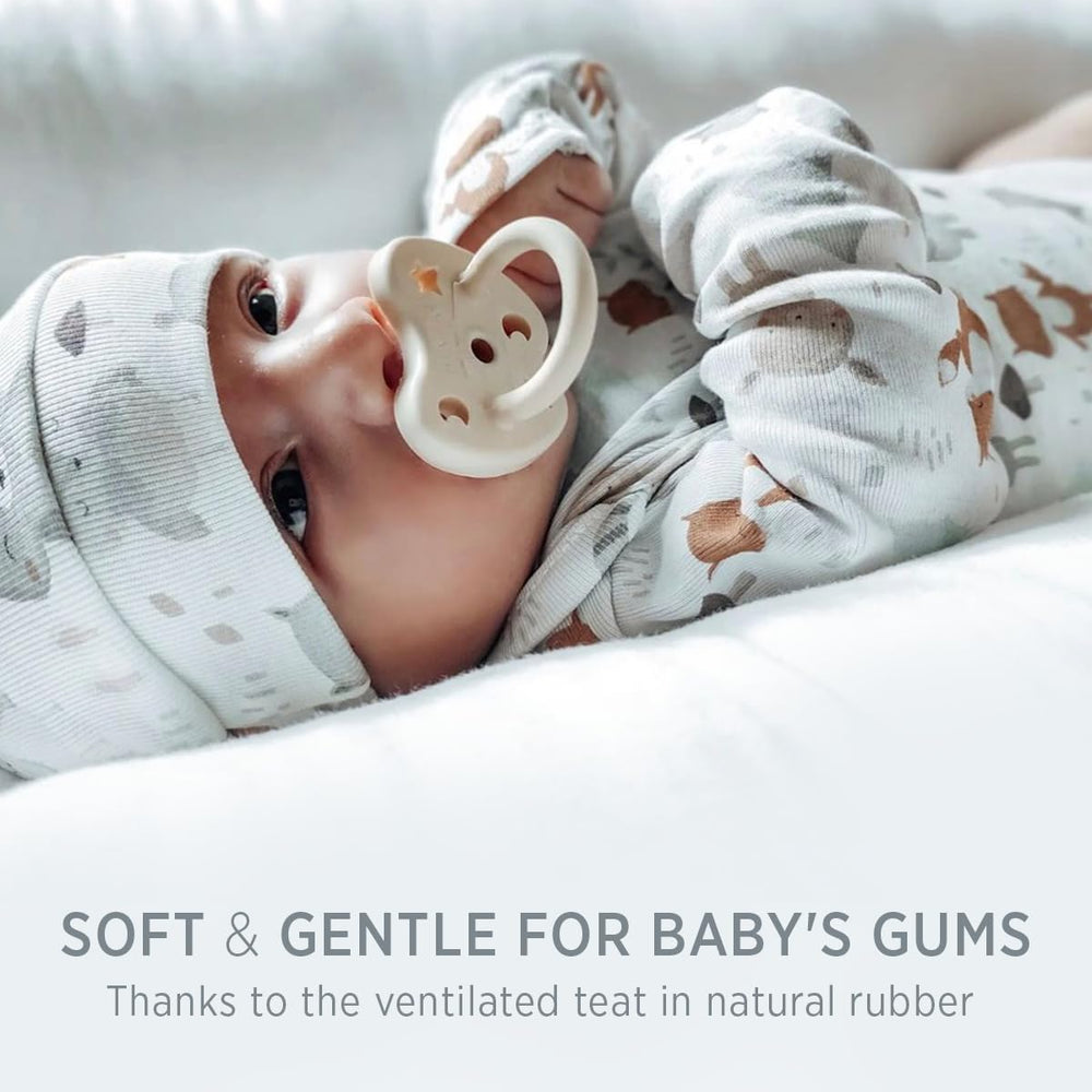 HEVEA baby hand holding pacifier showcases easy-to-use design for infants