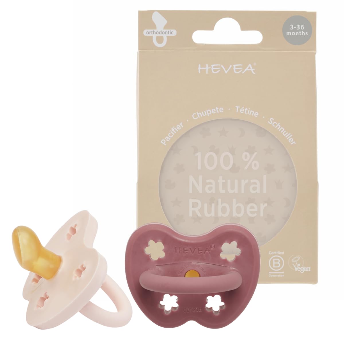 HEVEA pacifier orthodontic powder pink demonstrates natural rubber soothing.