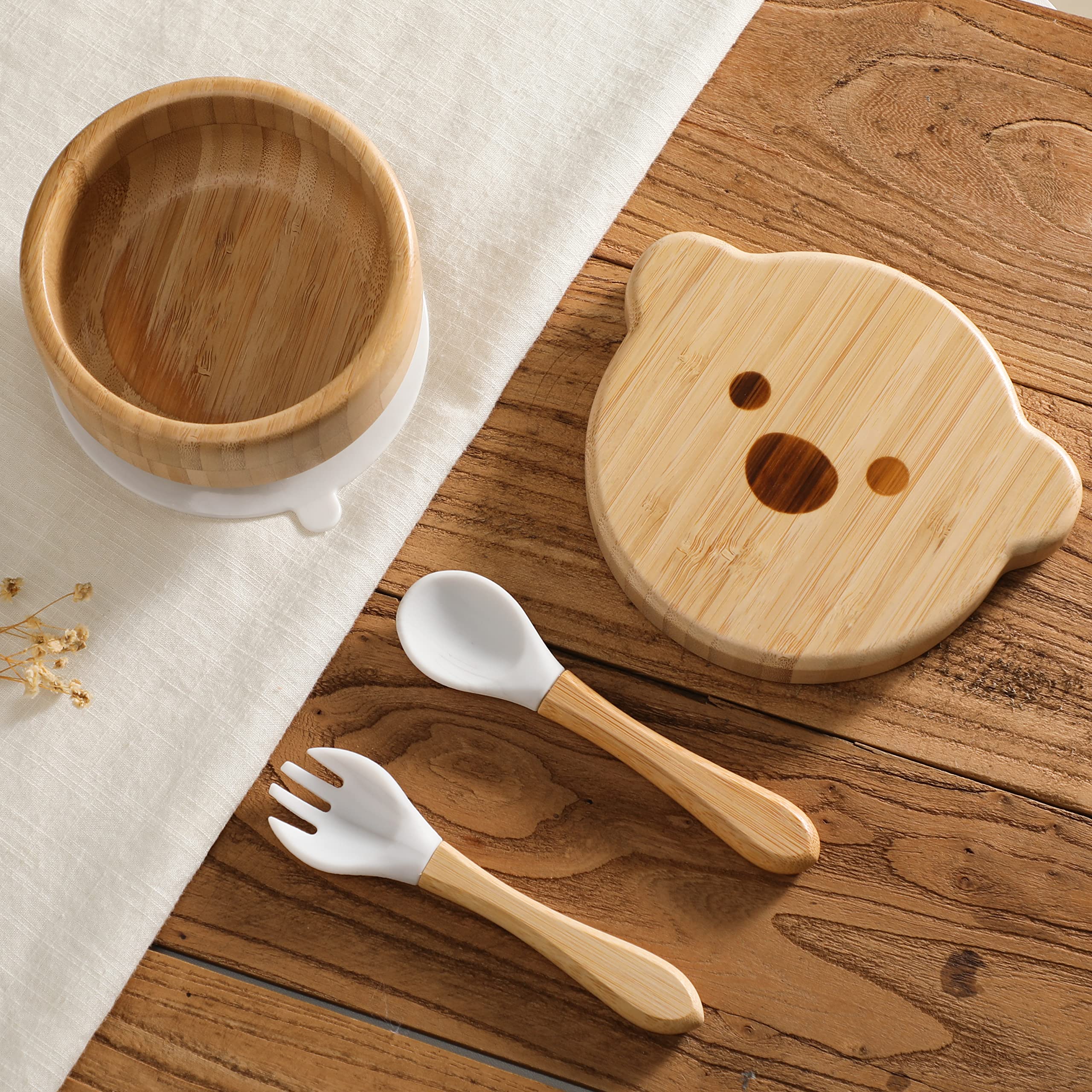 HI BABY MONMENT spoon set designed for tiny hands to encourage self-feeding.