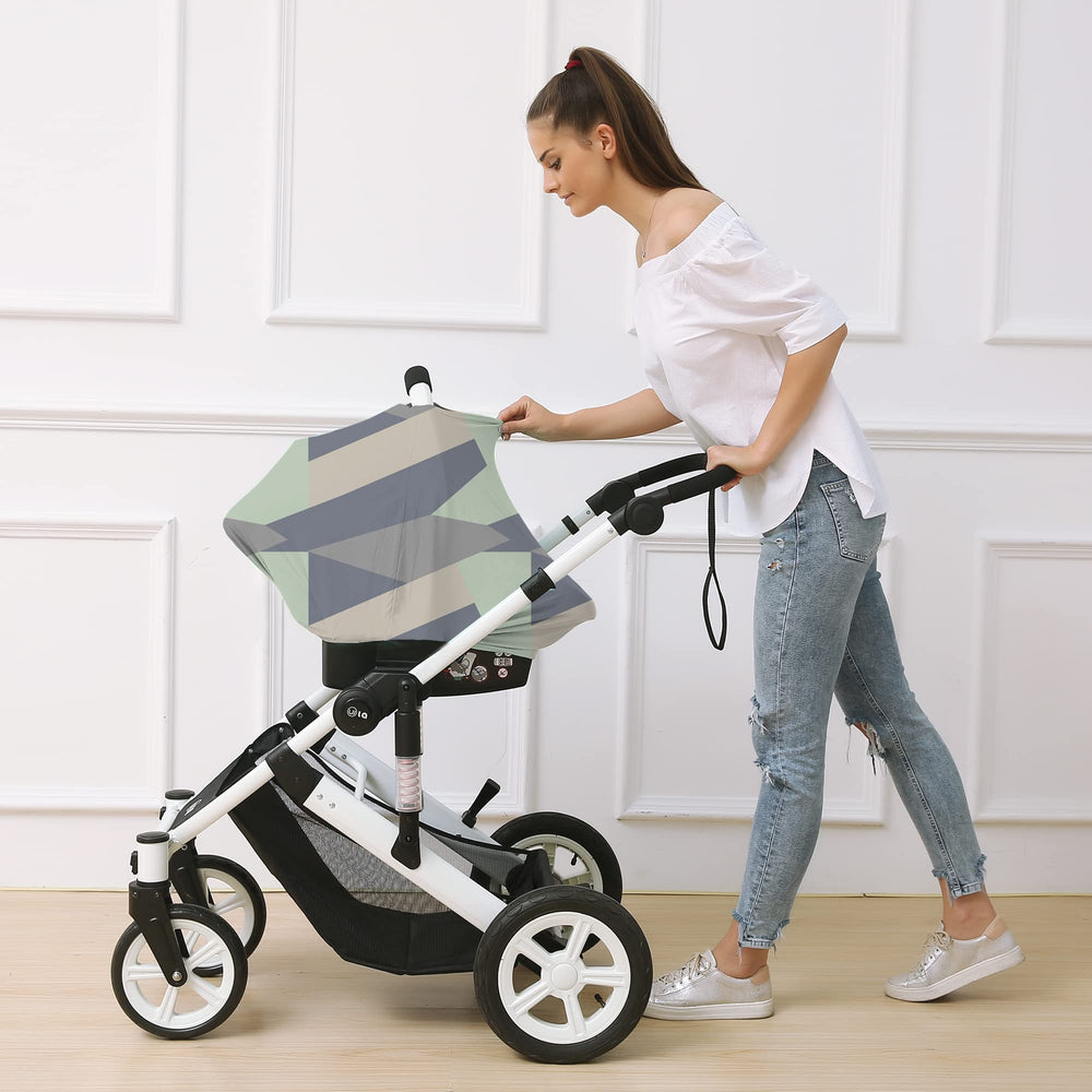 Hicoco stroller cover in Baby Green shields sun and wind during walks