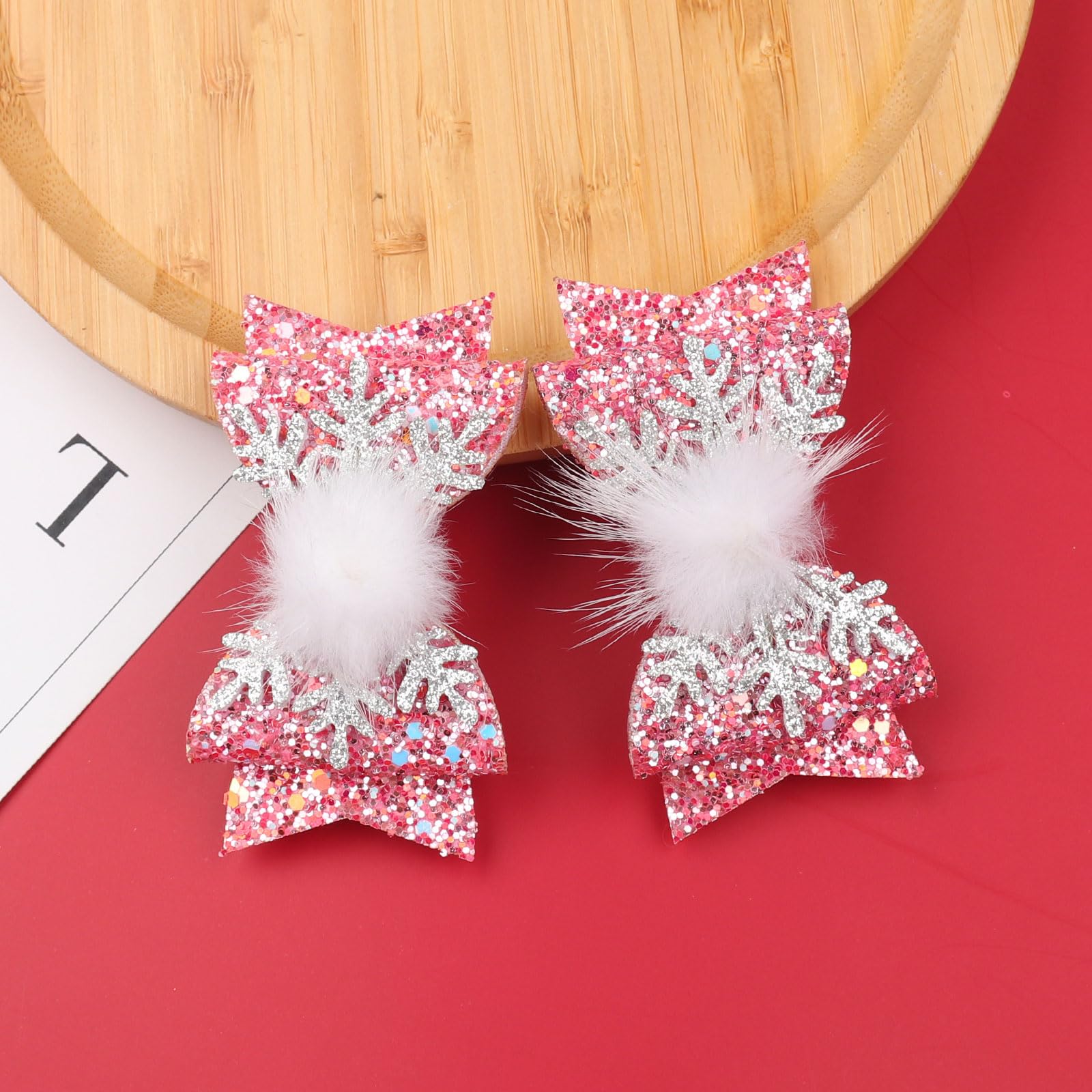 HIFANMM snowflake bow clip with silver glitter adds frosty charm to party hairstyles