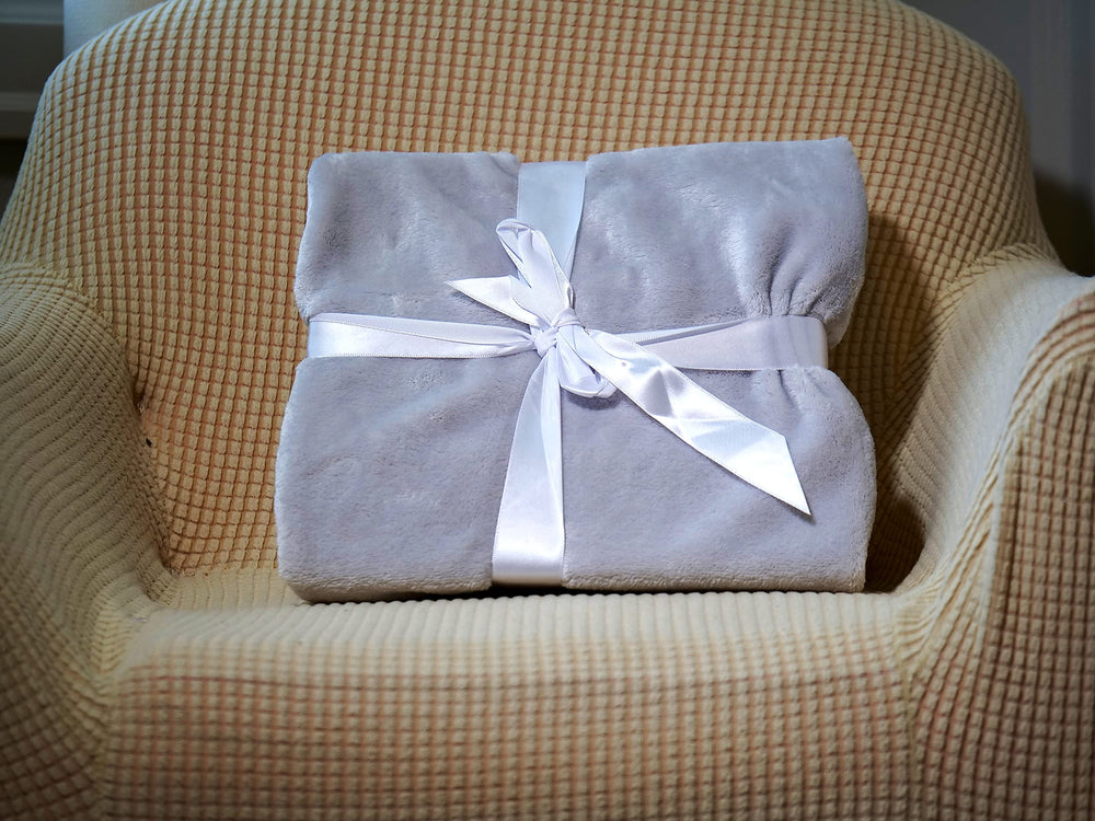 Higher Comfort Grateful Gray baby-in-use scene shows cozy swaddle-like warmth during cuddles.