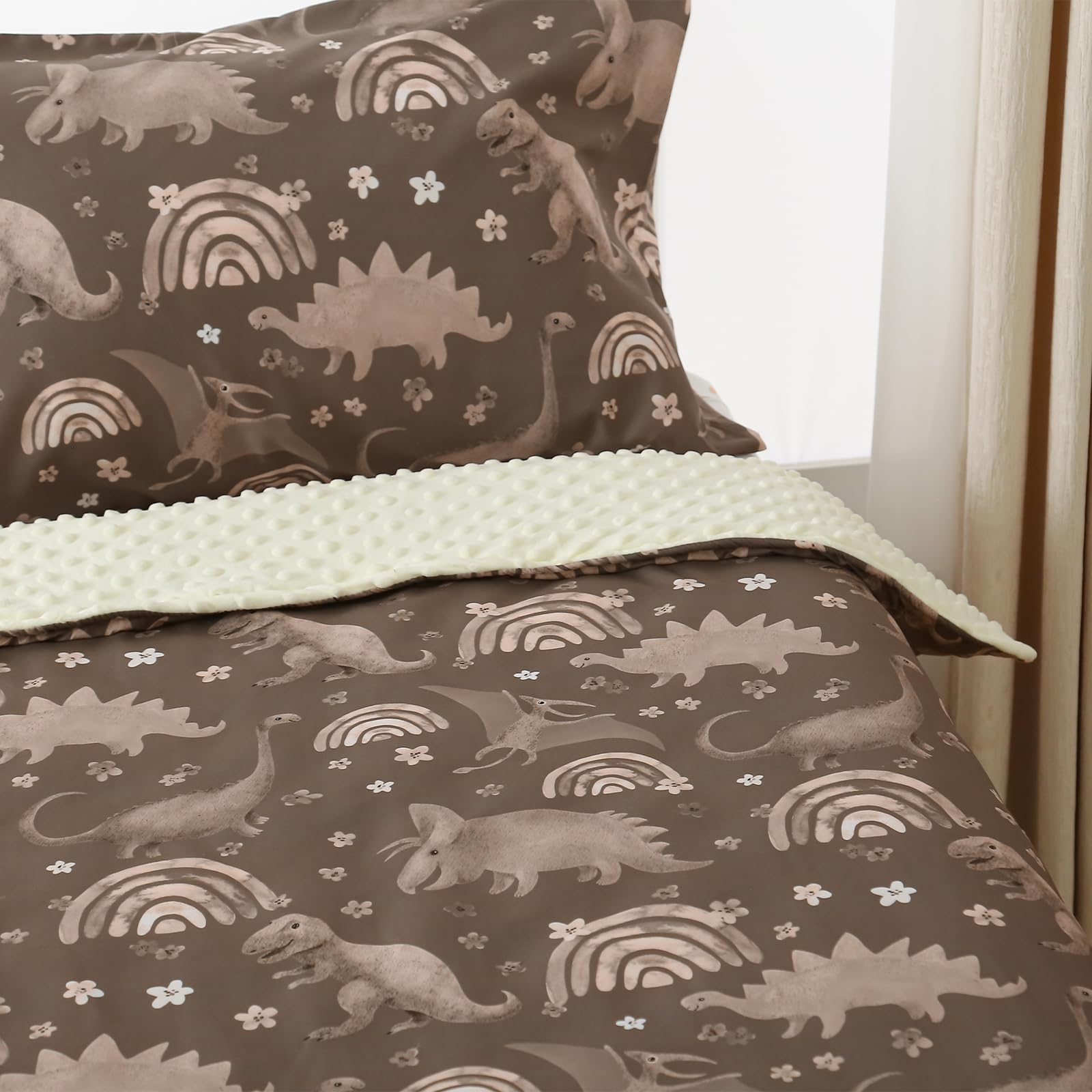 Hilabab dinosaur bedding set packaging shows complete four-piece kit.