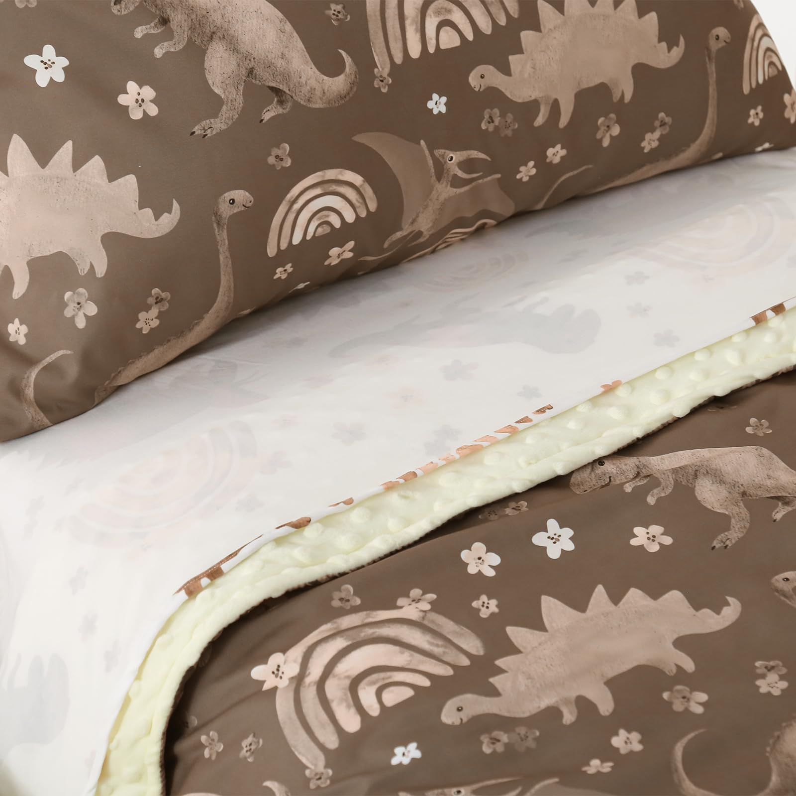 Hilabab dinosaur reversible comforter offers cozy warmth and versatile style.