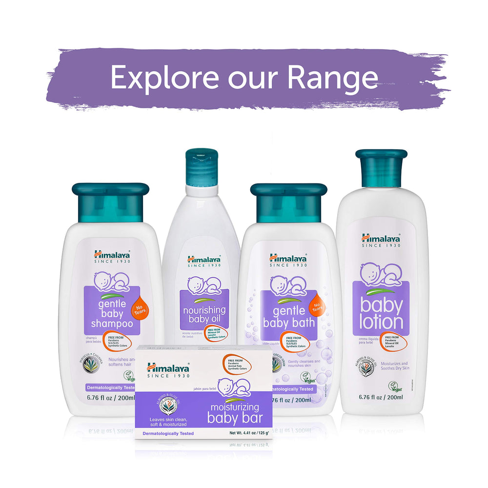 Himalaya Nourishing Baby Oil bottle beside bath setup for post-bath moisture.