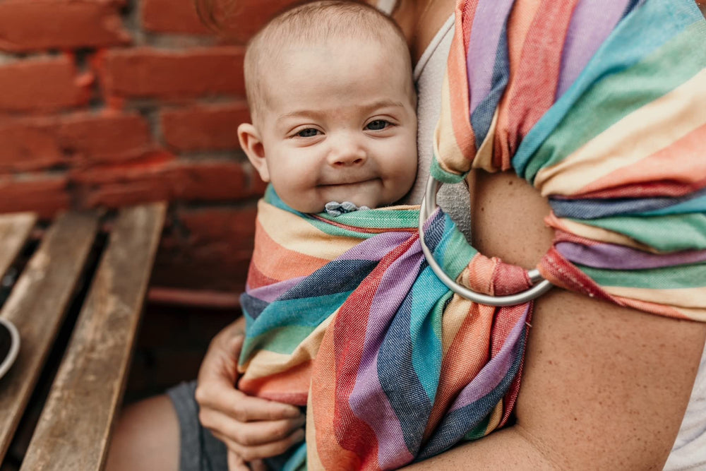 Hip Baby Wrap summer-rainbow-print adds cheerful style to outings