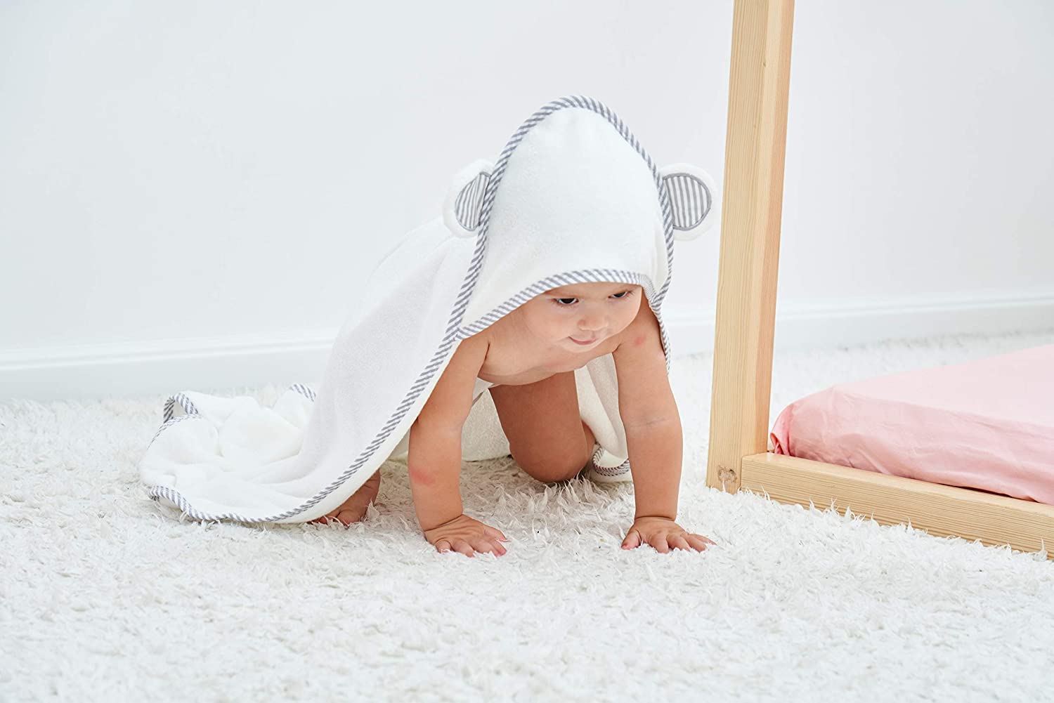 HipHop Panda hooded towel white-drape captures sweet bath moments.