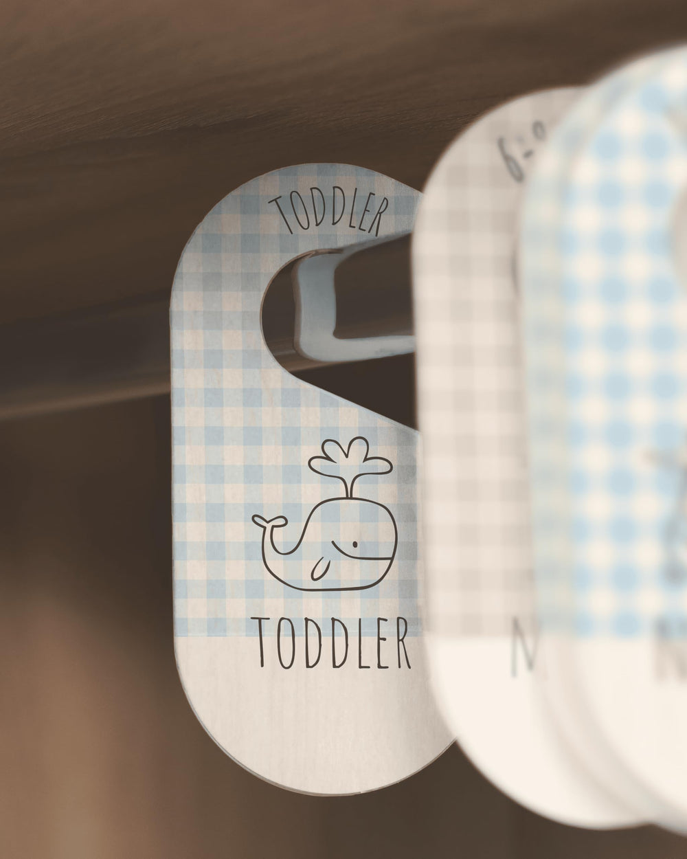 HIPPOTALE blue gingham dividers complement gender-neutral nurseries with soft color tones.