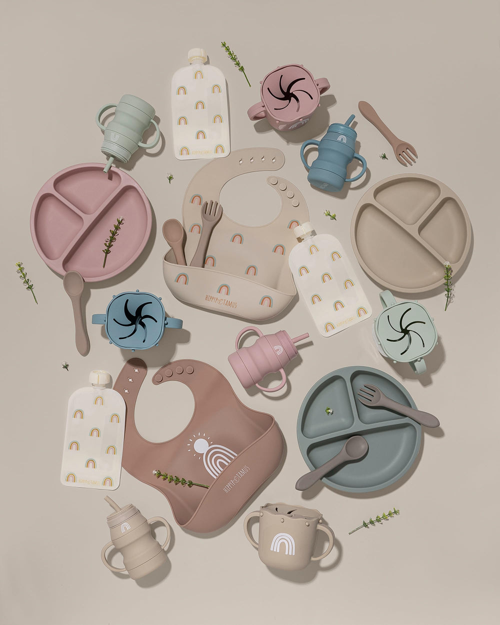 Hippypotamus bib rolls for travel and nests for storage