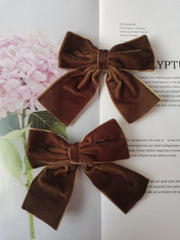 Hjiaruiky brown velvet bow clip close-up showing durable construction.