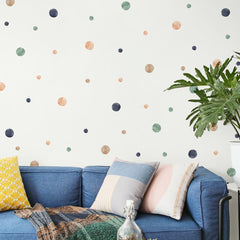 HJKlove boho rainbow dots on nursery wall provide calming playful ambience
