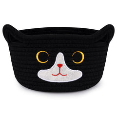 Hkojewp cat basket with embroidered face for blankets and toys.