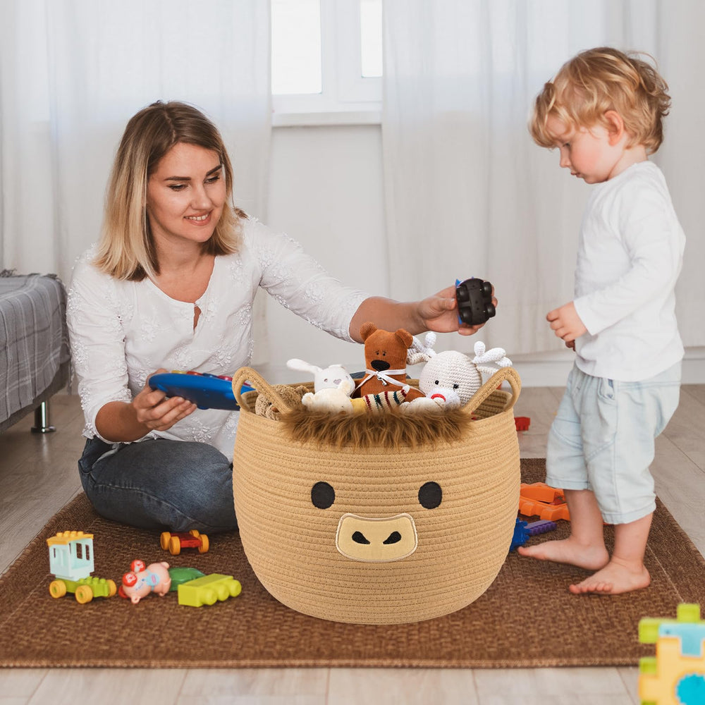 Hkojewp Highland Cow Basket used for toy storage in a living area