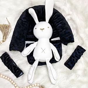 HNHUAMING classic black headrest with pillow-like cushioning during car travel.