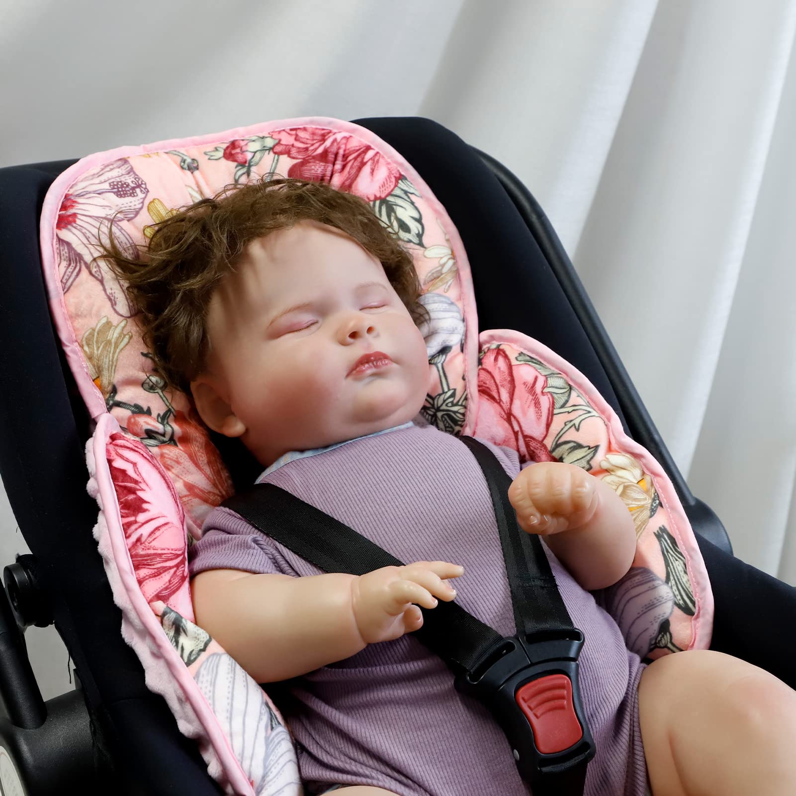 HNHUAMING infant insert complements flower-themed accessories for a coordinated nursery.