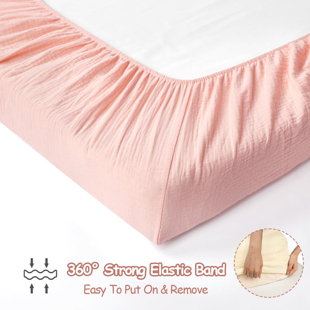 HNHUAMING neutral pink and beige pattern adds calm, gender-neutral styling to nursery linens