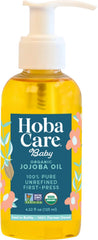 HobaCare Jojoba Baby Oil pump bottle demonstrates easy, mess-free application for daily skin moisture.