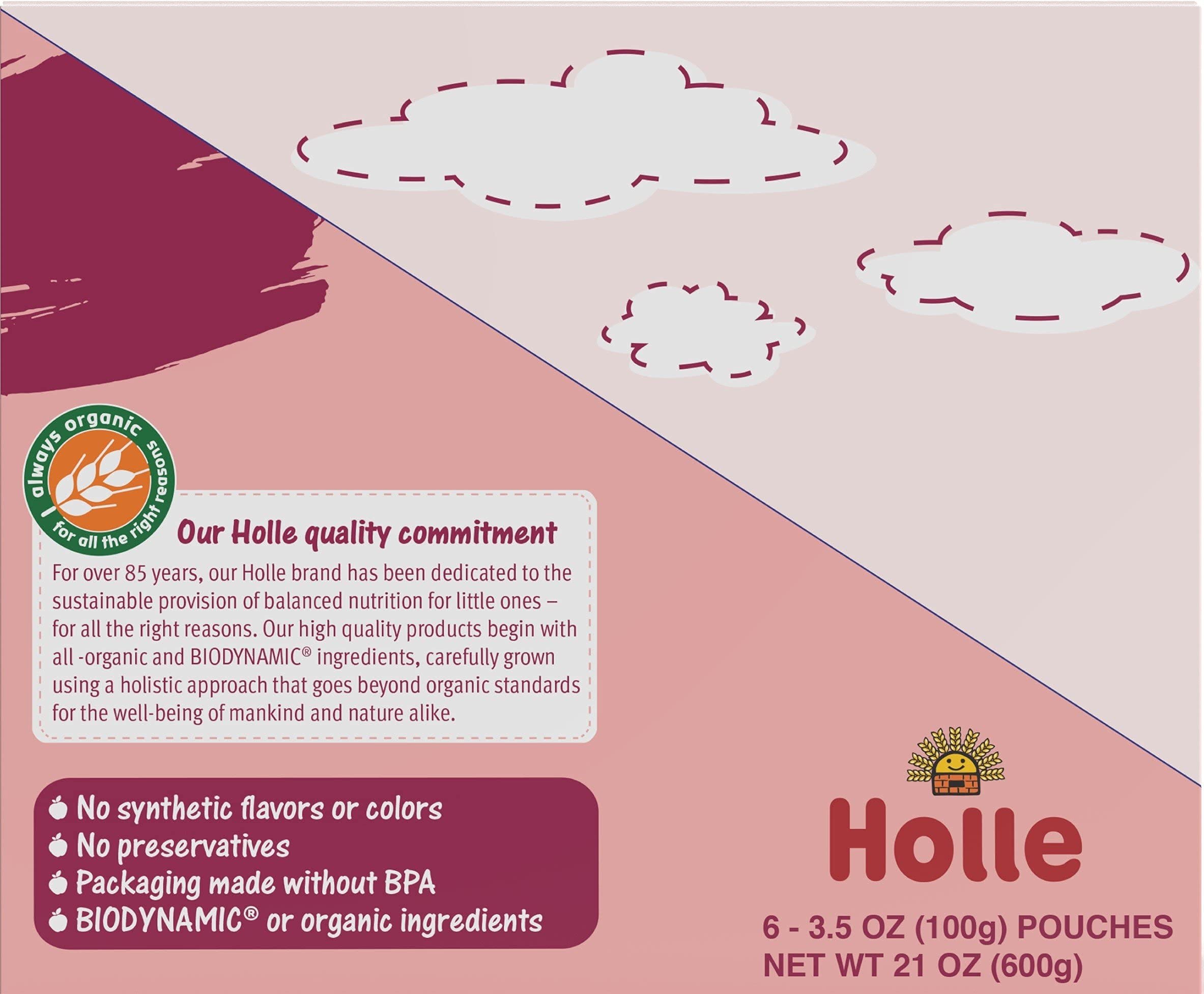 Holle baby eating puree with spoon demonstrates real life mealtime use
