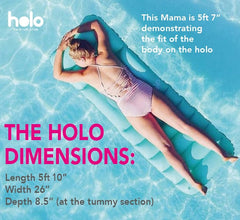 HOLO floating on water for versatile land and water relaxation.