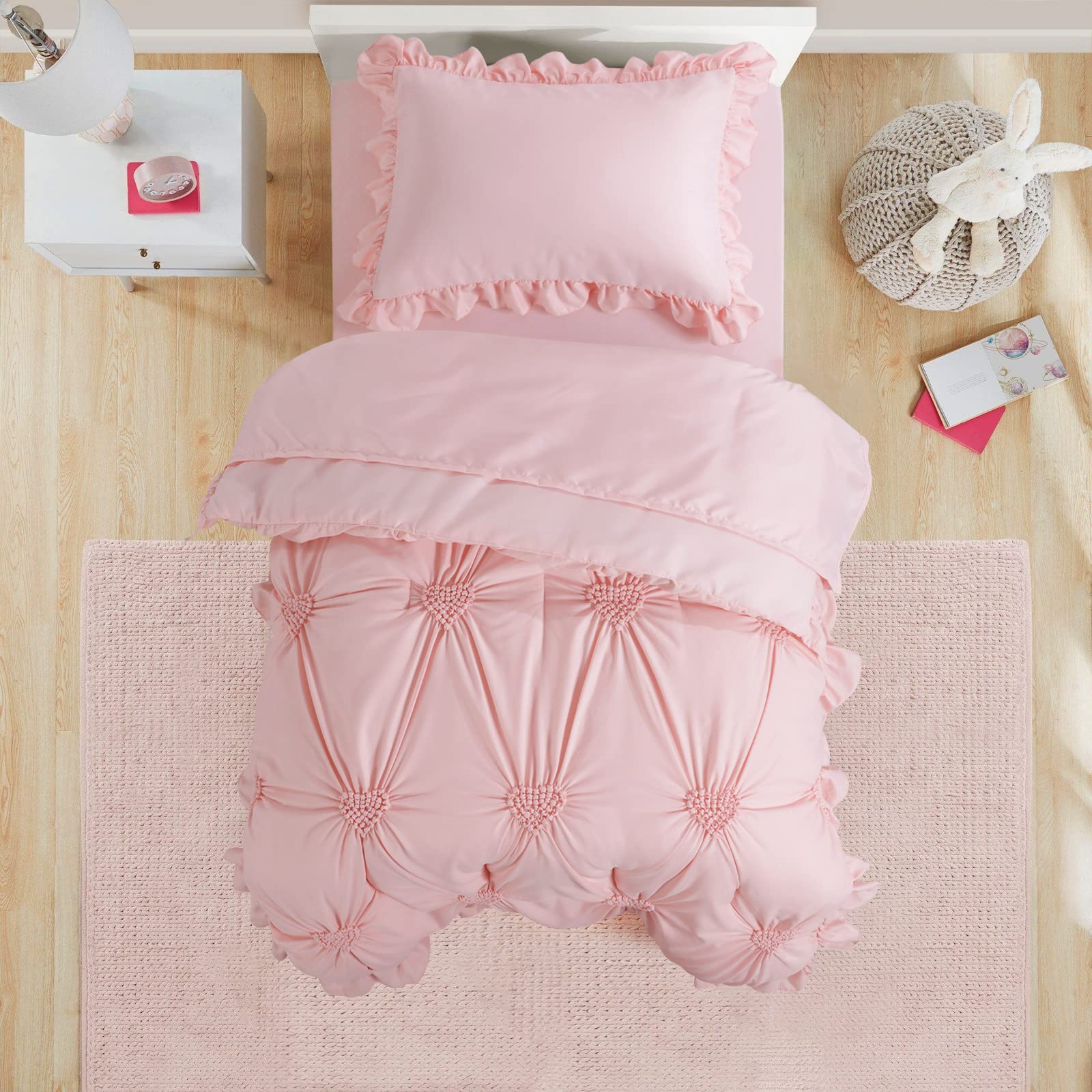 Close-up of HOMBYS pintuck and ruffles detailing