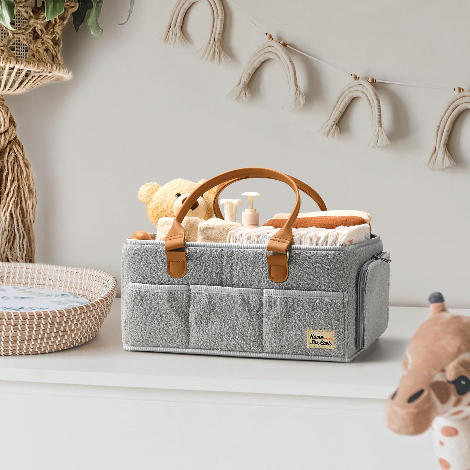 HOME FOR EACH diaper caddy with accessible design supports on-the-go organization.