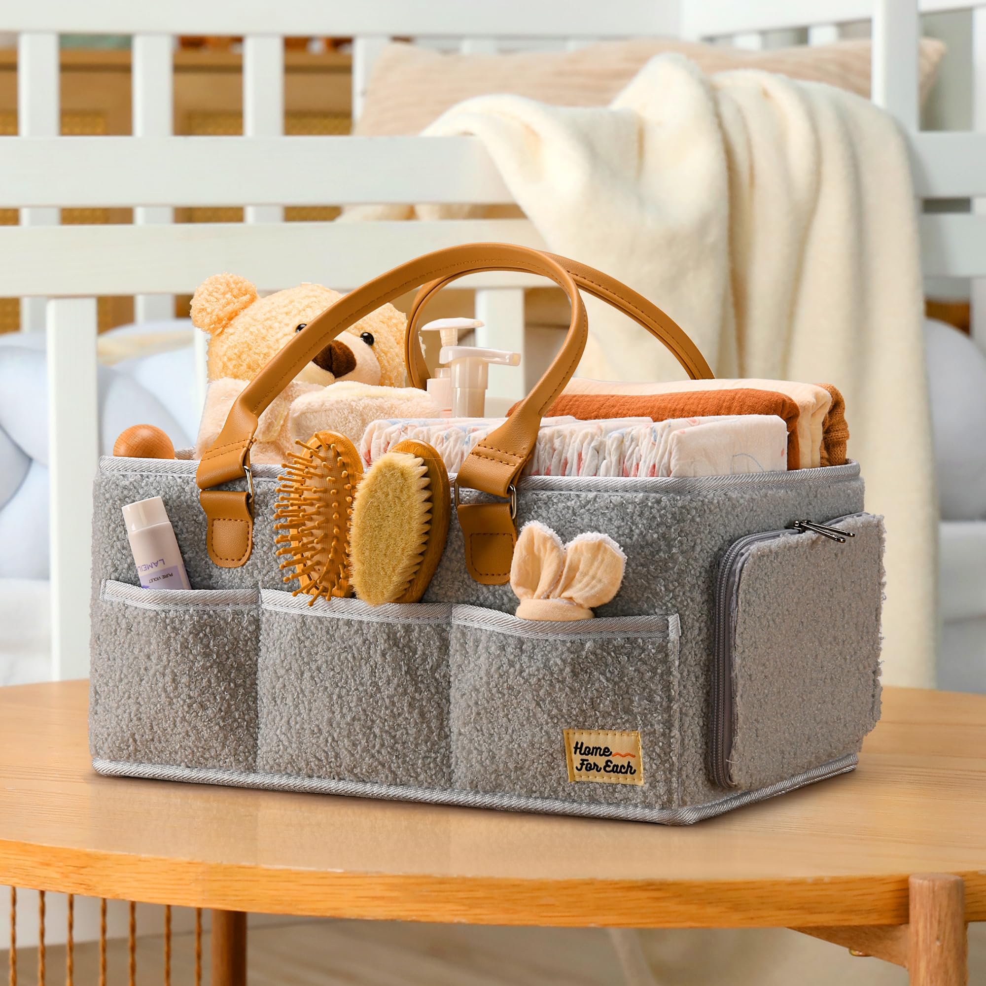HOME FOR EACH stroller-ready diaper caddy keeps essentials within arm's reach on walks.