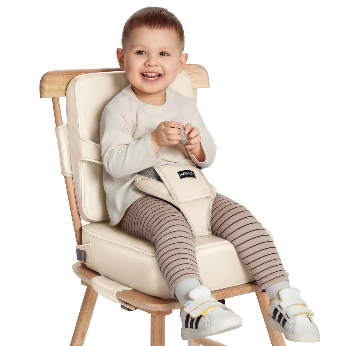HOMEAL toddler booster seat on beige dining table elevating child for family meals