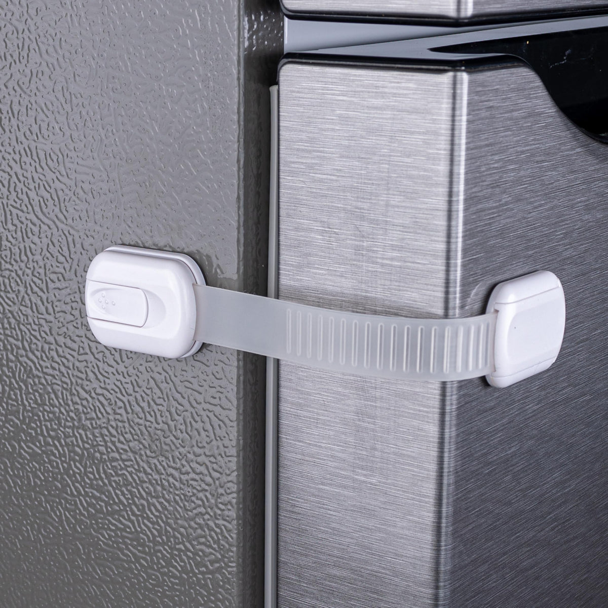 HomeBrella fridge lock adhesive in use secures doors for safety.