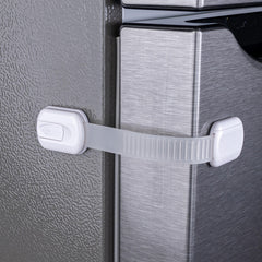 HomeBrella fridge lock adhesive in use secures doors for safety.