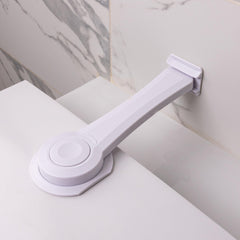 HomeBrella toilet locks adhesive installation shows tool-free setup for quick child safety.