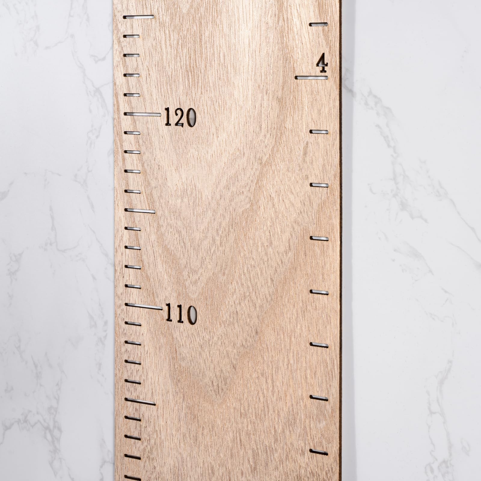 HOMEE growth chart patchwork design displayed as customizable wall decor.