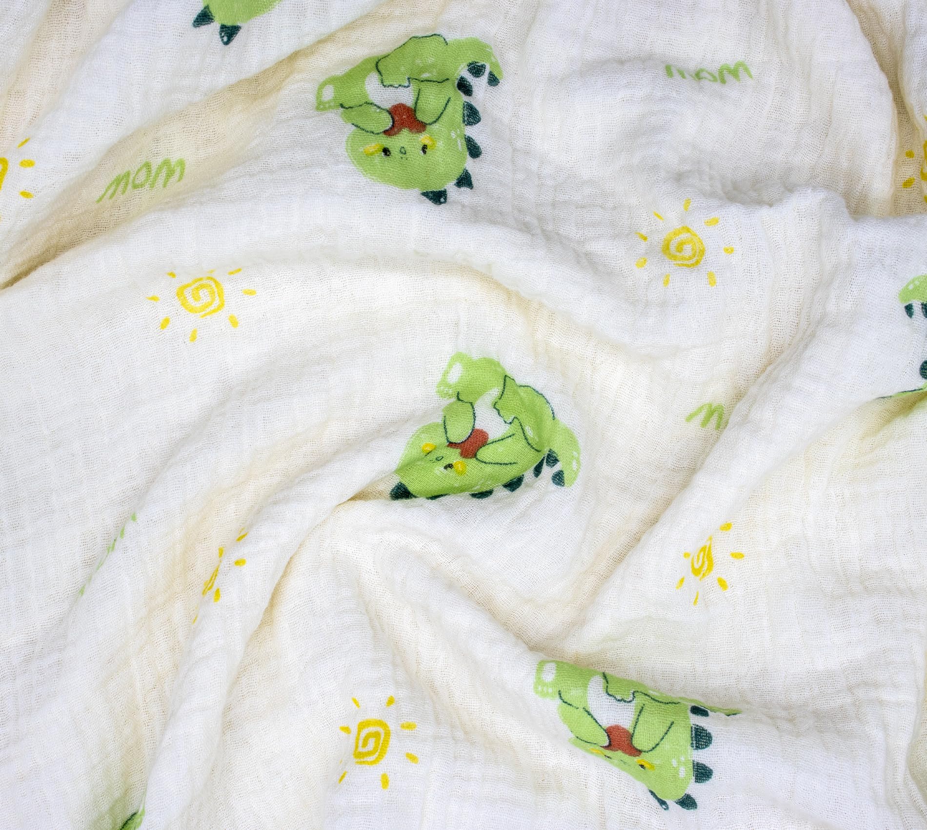 HomeyHues baby blanket dinosaur pattern folded for travel-friendly size