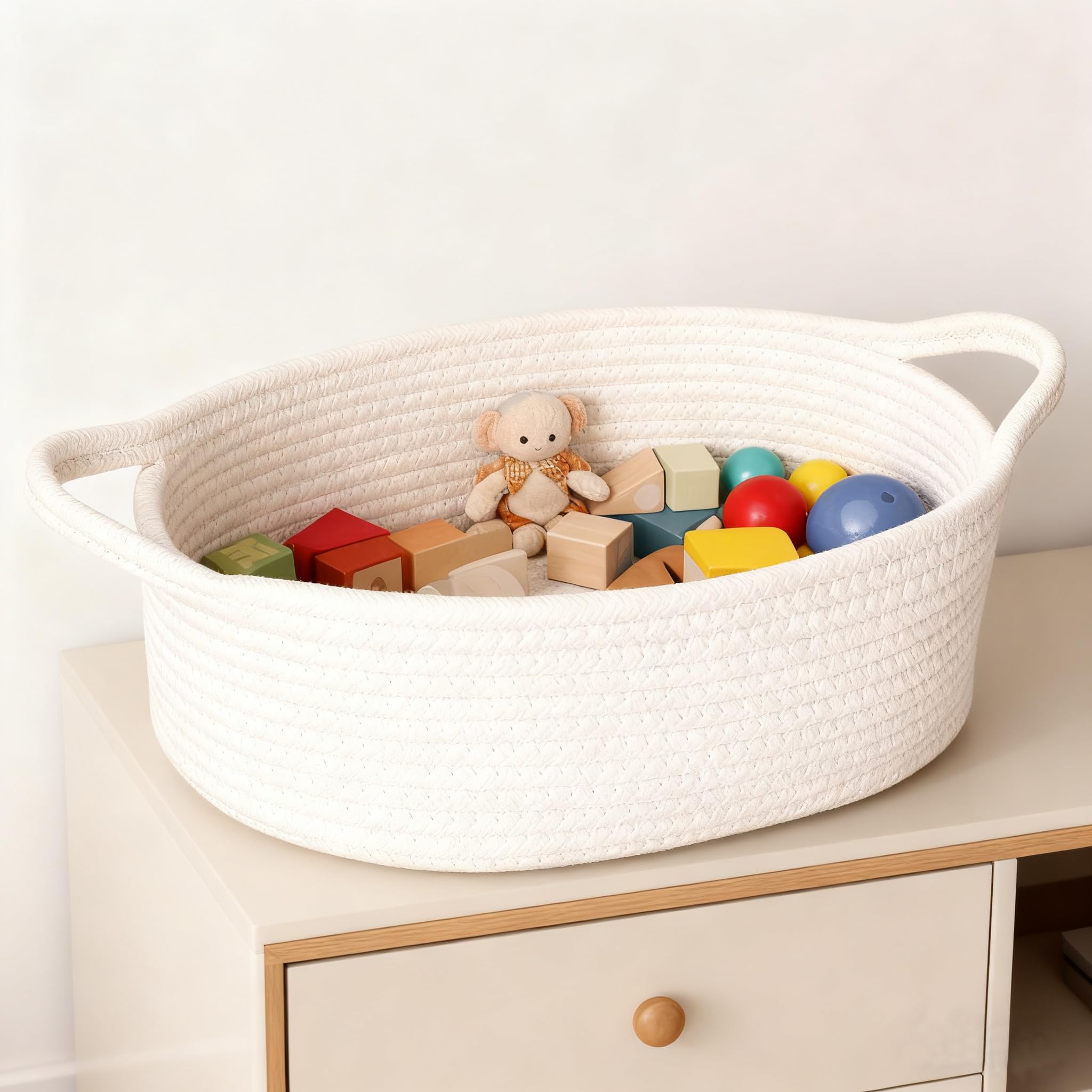 HomeyPine towels and diapers organizer basket ideal for bathroom or nursery organization.