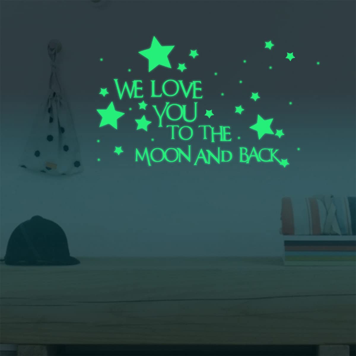Homics We Love You to the Moon and Back glow decal shines at night for comforting bedtime.