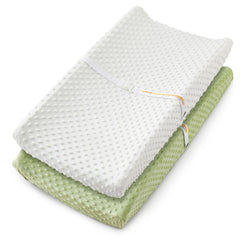 Homiest 2-pack changing pad cover in white and sage on a standard pad for easy daily diaper changes