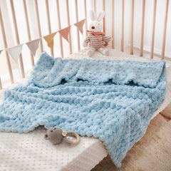 HOMRITAR blanket doubles as chic nursery decor and warmth.