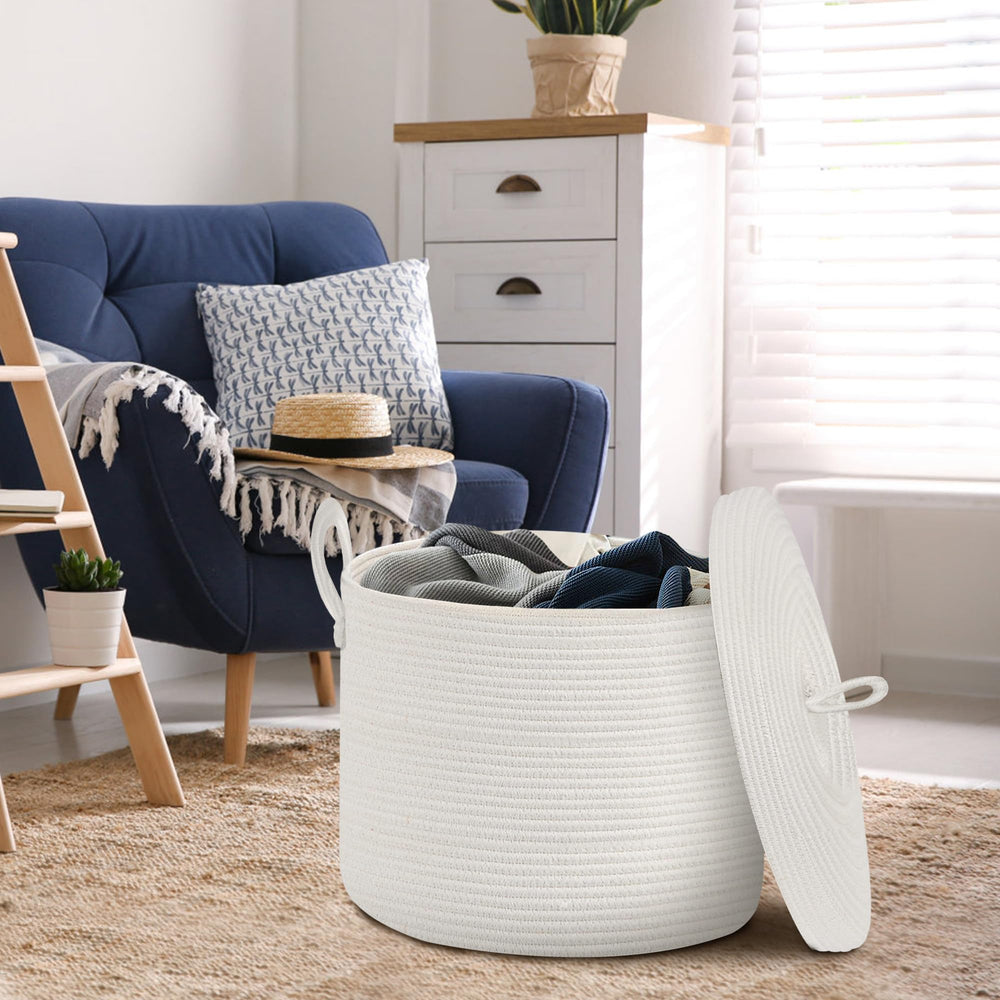 HONCESTA decorative white basket for towels and pillows—stylish storage.